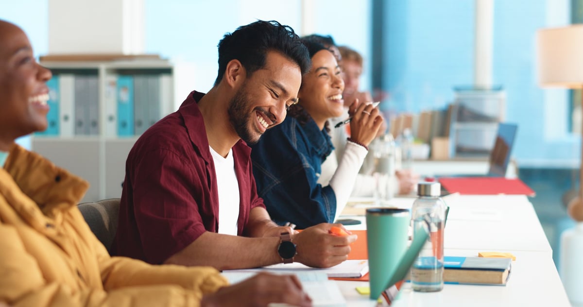 Diverse adult learners collaborating in a workforce development classroom cohort